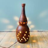 Terracotta lamp with cut-outs, circa 1970.