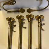 Supports curtain rods and ambers