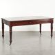 Antique English writing desk from the late 19th century with a warm colour