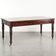 Antique English writing desk from the late 19th century with a warm colour