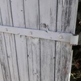 Pair of large wooden iron hanging shutters