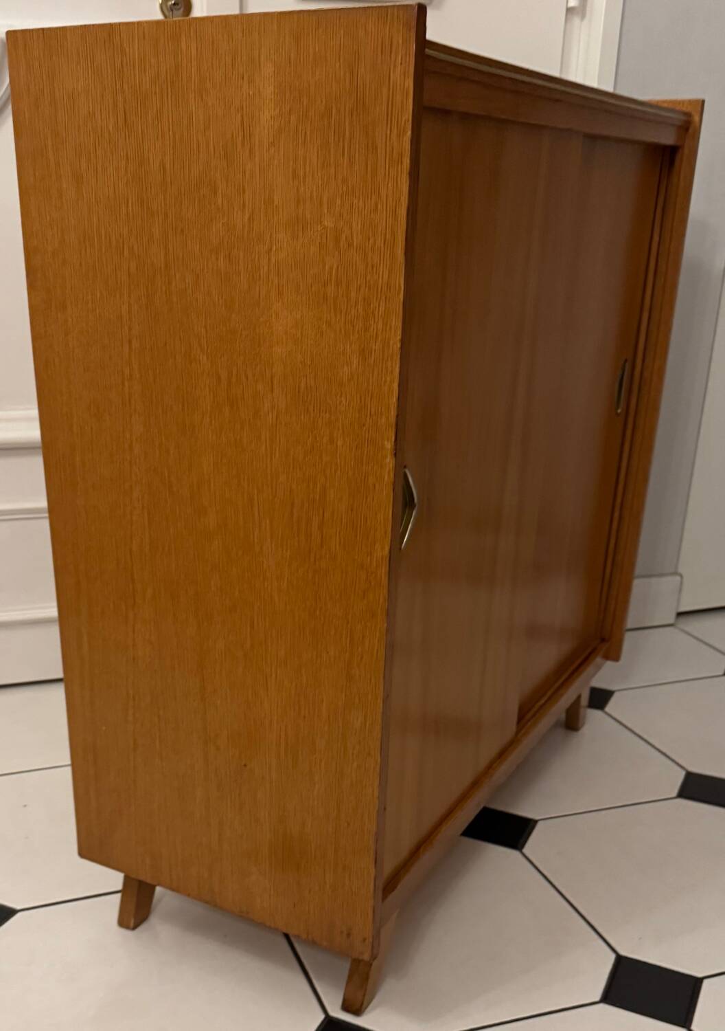 Vintage shoe cabinet with compass legs