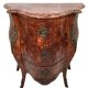 Louis XV style chest of drawers, richly inlaid, animated front and side. 19th century
