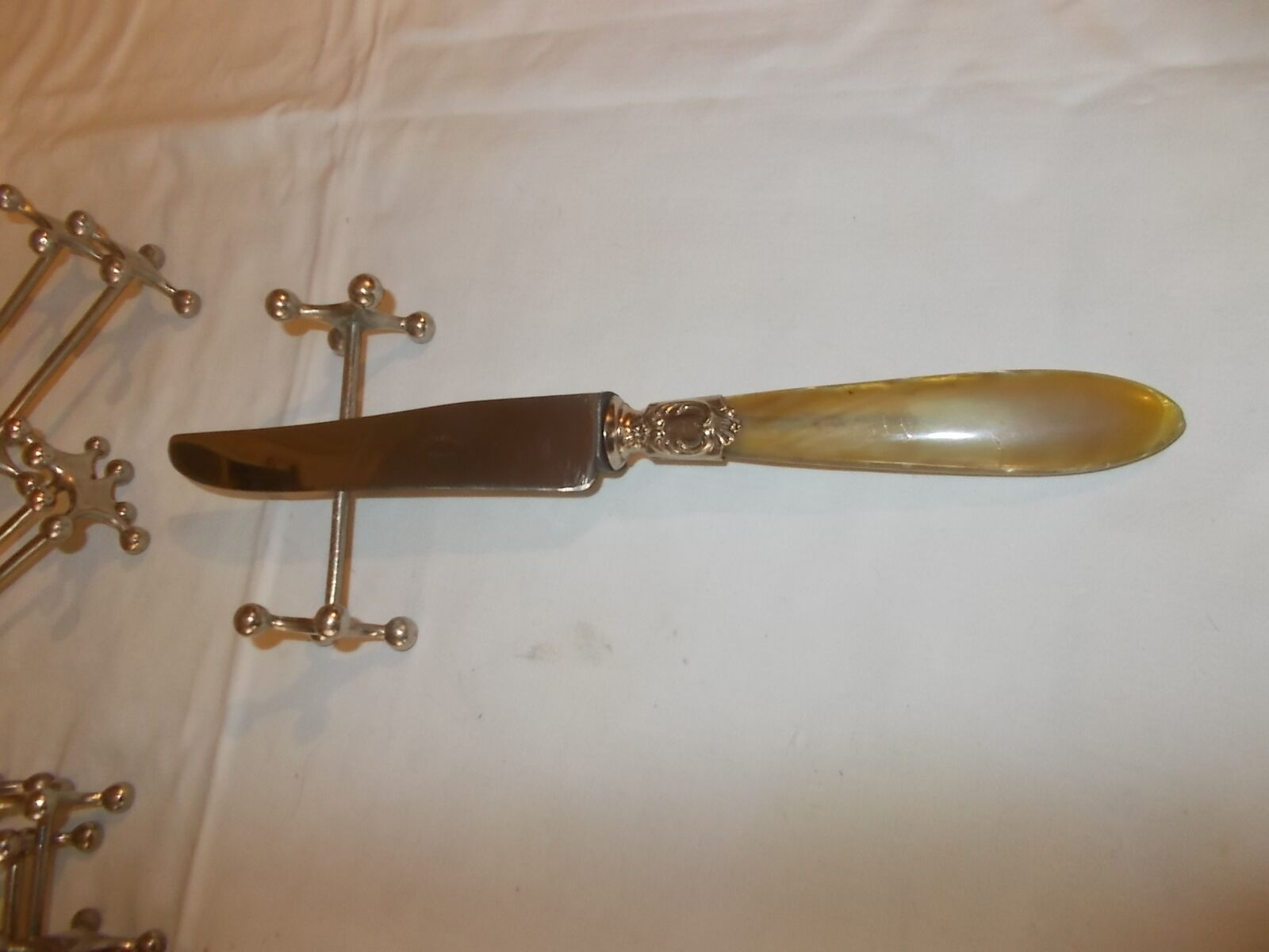 Set of 11 knife rests