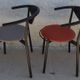 4 Gondola-style chairs with a sturdy metal frame and faux leather for