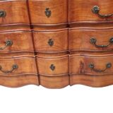 Crossbow chest of drawers with caramel patina