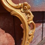 Baroque frame in carved gilded wood