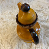 Teapot in yellow ceramic with the logo
