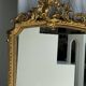 Large gilded mirror with acanthus leaf pediment H150 L98