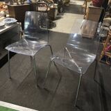 Pair of smoked polycarbonate chairs