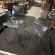Pair of smoked polycarbonate chairs