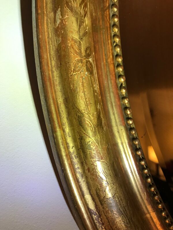 Miroir ovale Louis XVI feuille d’or