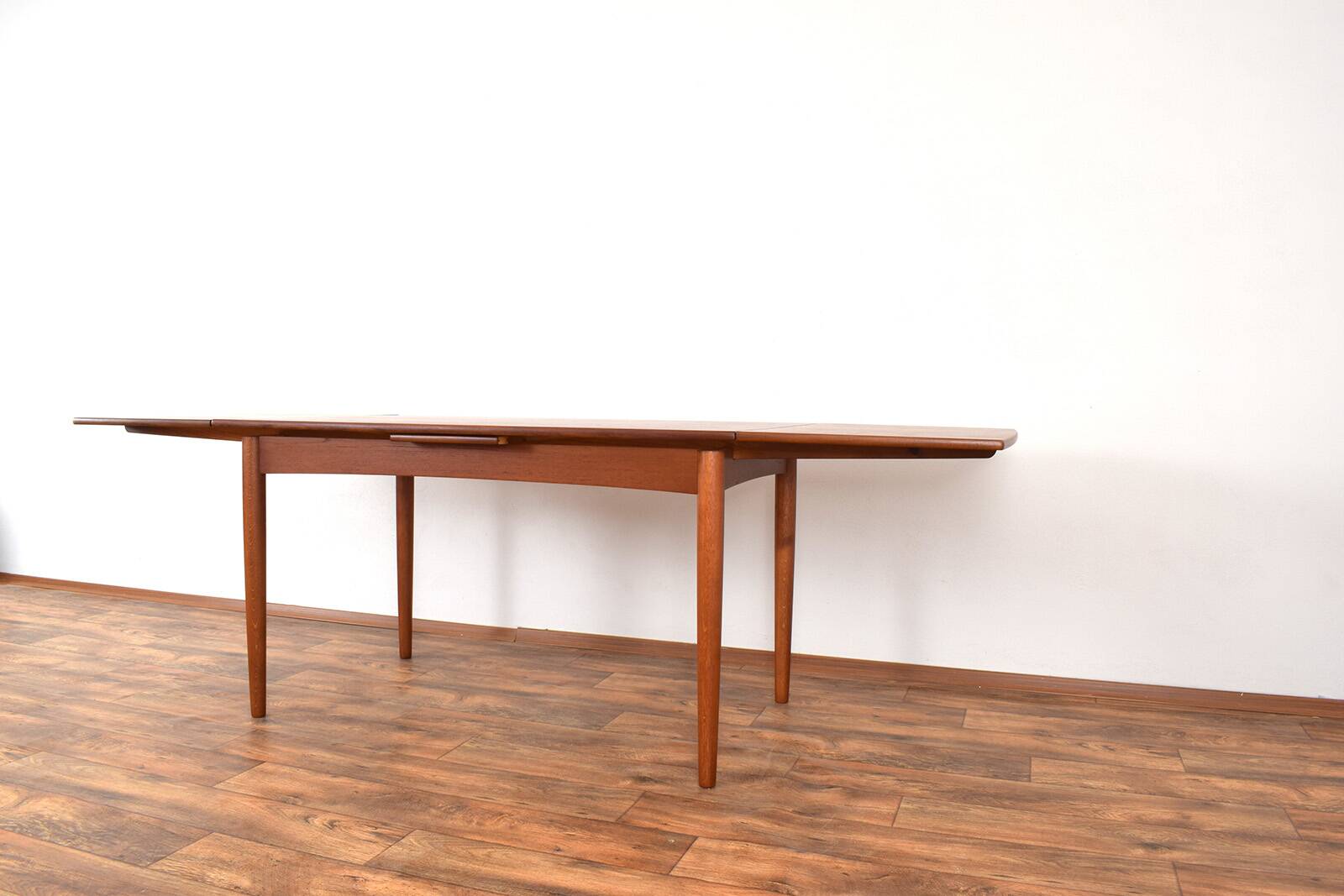 Mid-century Danish teak extendable dining table, 1960s.
