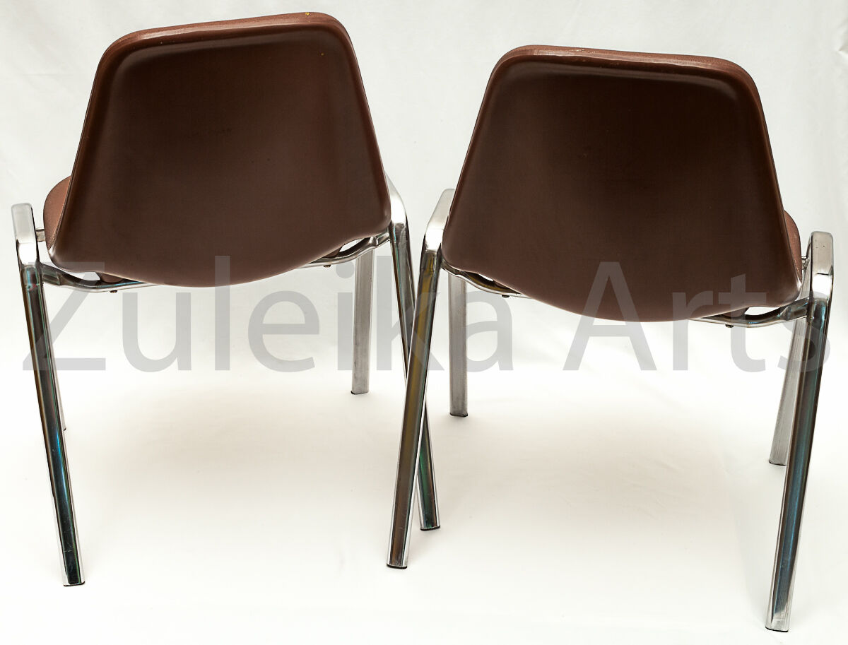 Two "ORLY" chairs by Bruno Pollak