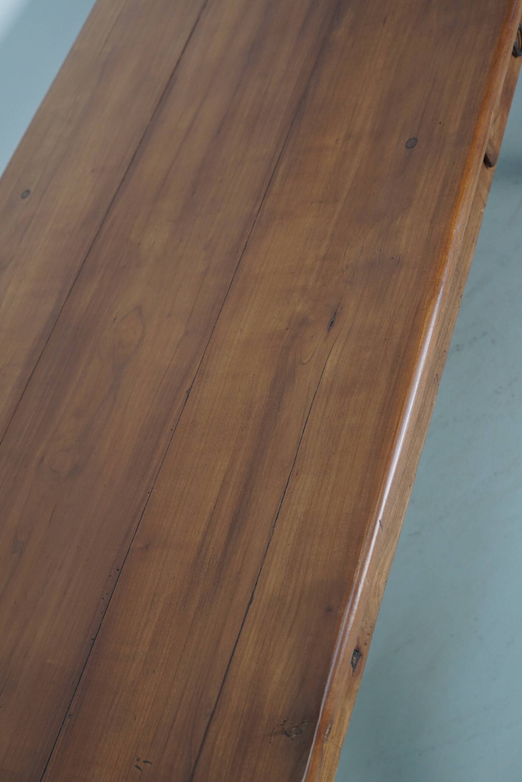 Rustic dining table in fruitwood from the early 20th century