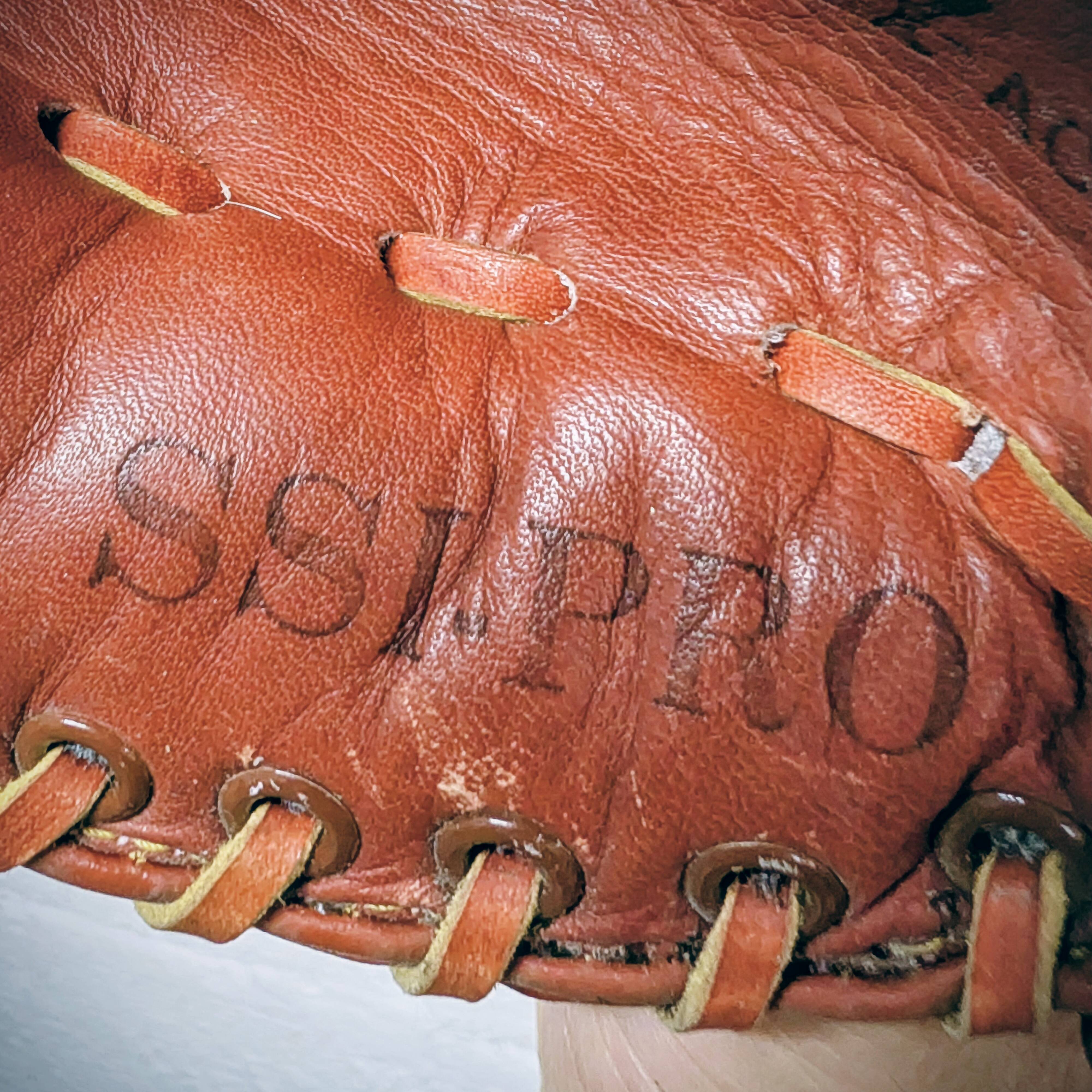 Baseball glove and ball