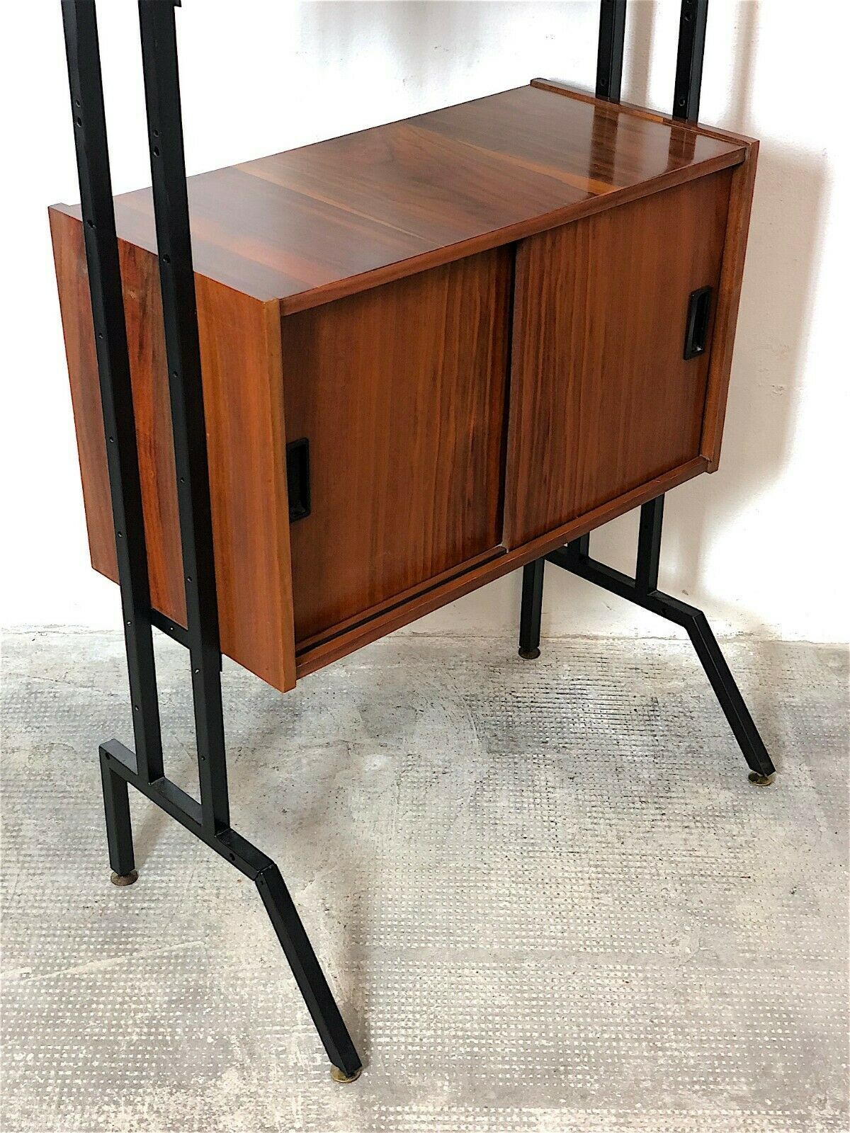 Modular storage cabinet and teak bookcase. Italy, 60s