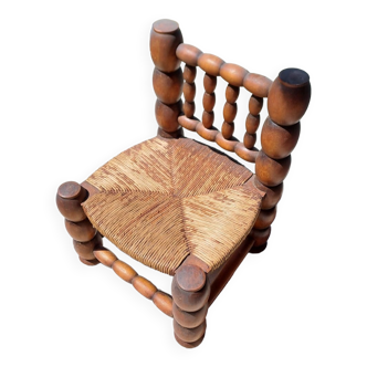 Chaise basse années 50 chêne et paille coin du feu