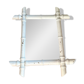 Old bamboo-shaped wooden mirror