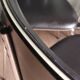 Suite de 4 chaises cuir synthétique noir & galon nacré