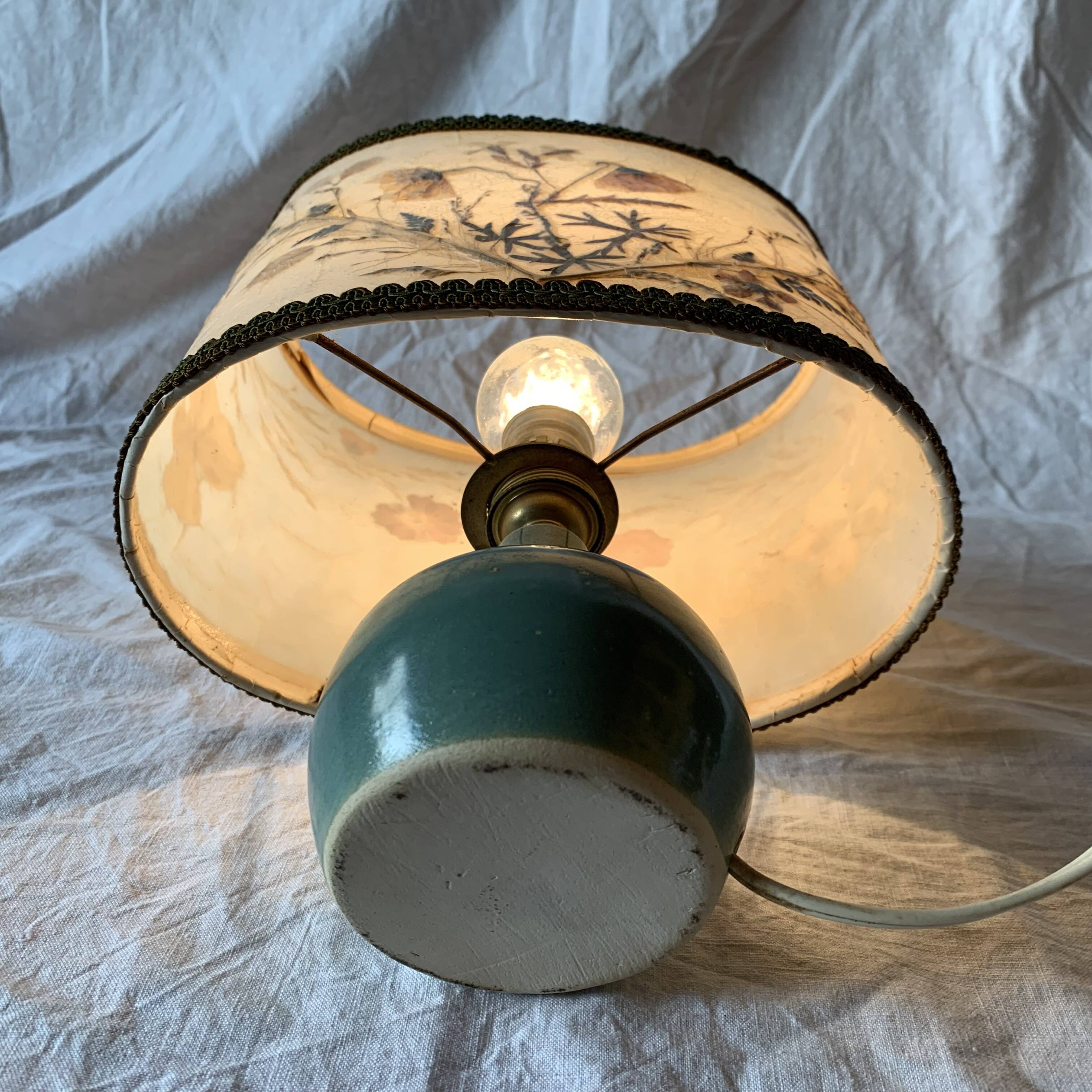 Old small green ceramic side lamp with dried flower lampshade