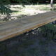 Pairs of benches in light wood and tubular metal