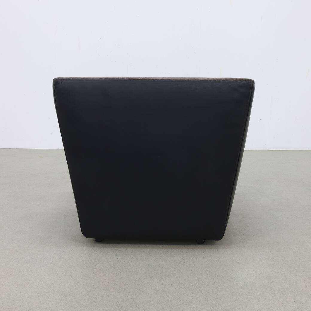 Postmodern Lounge Chair in Leather on wheels by COR
