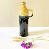 Enameled ceramic bottle with handle