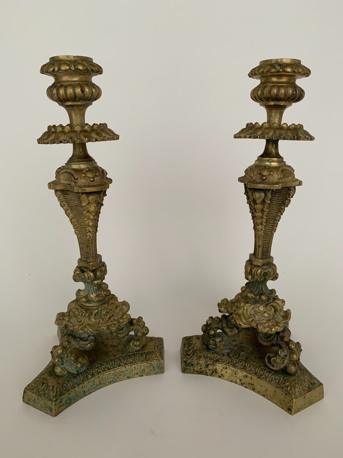 Pair of bronze candle holders with neogothic nineteenth chiseling