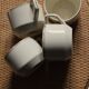 4 cups in ecru and gold Sarreguemines earthenware