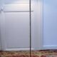 Articulated reading floor lamp in gold metal from the 90s