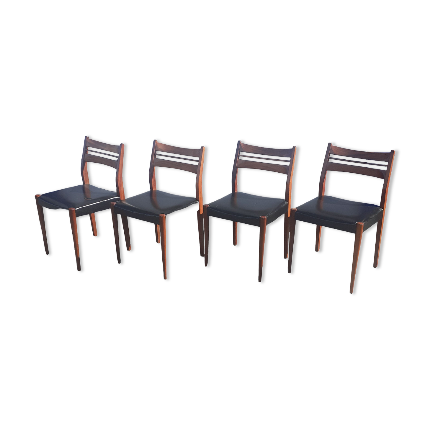 Scandinavian chairs in teak and black skaï.