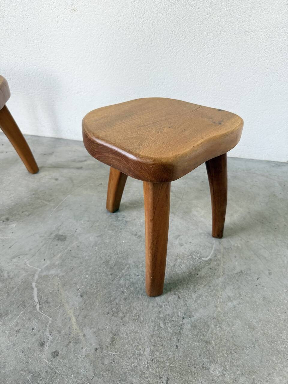 Pair of Henri Bataille oak stools