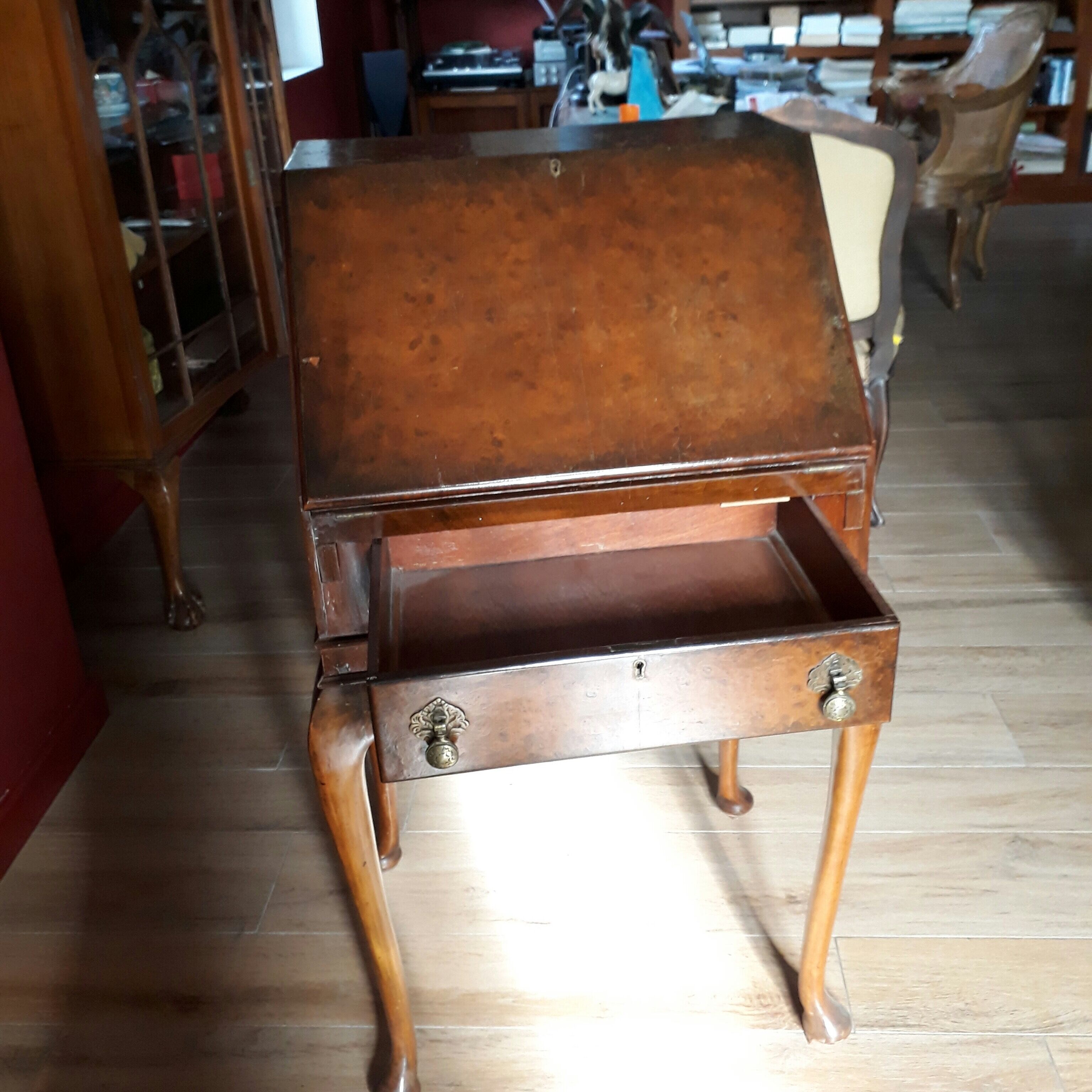 Antique secretary with drop-leaf flap