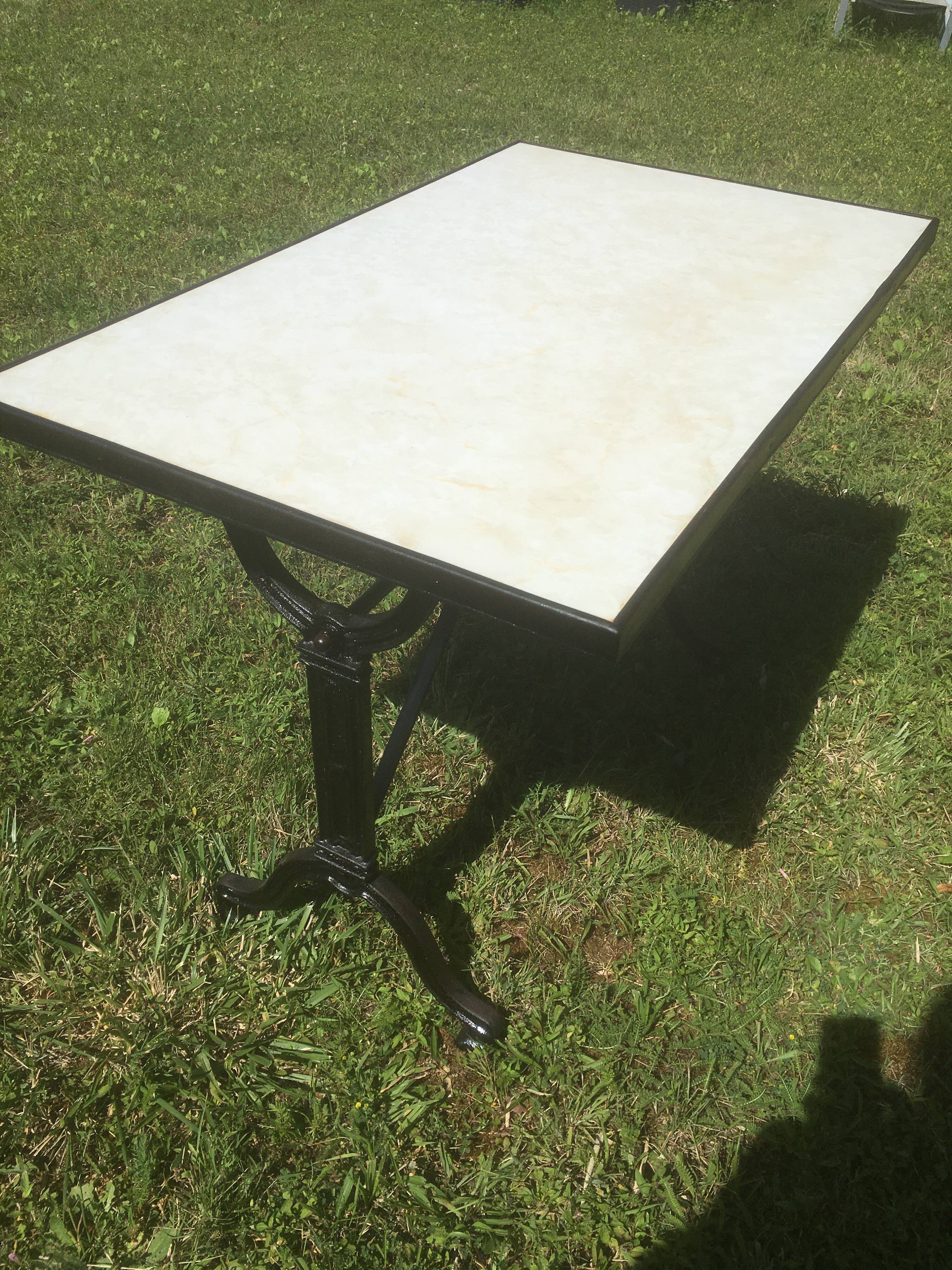Bistro table with cast iron base