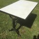Bistro table with cast iron base