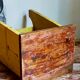 Art-populaire workshop stool in patinated wood