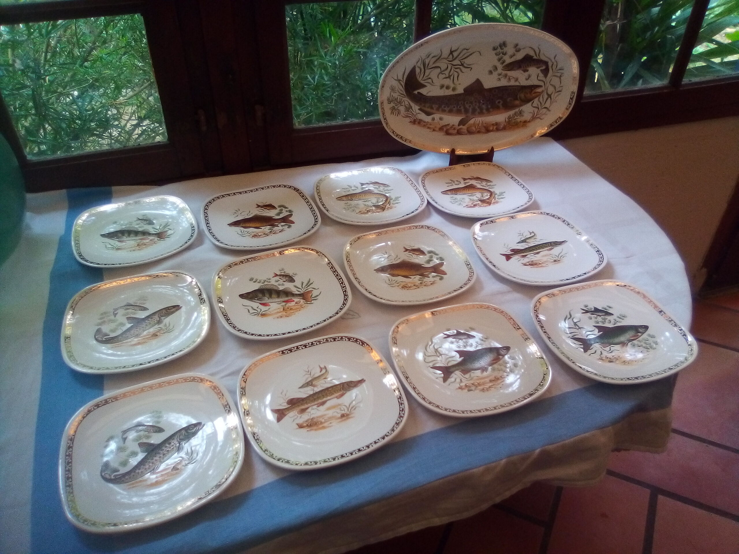 Set of 12 Longchamp plates and fish dish