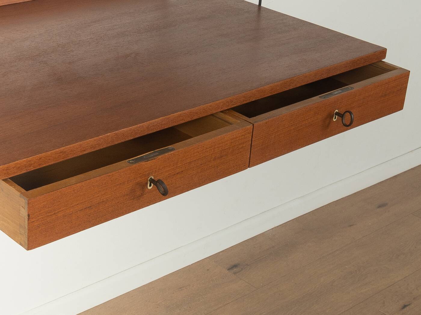 Original String shelf by Nils Strinning in teak veneer, 1949