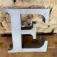 Letter metal - e