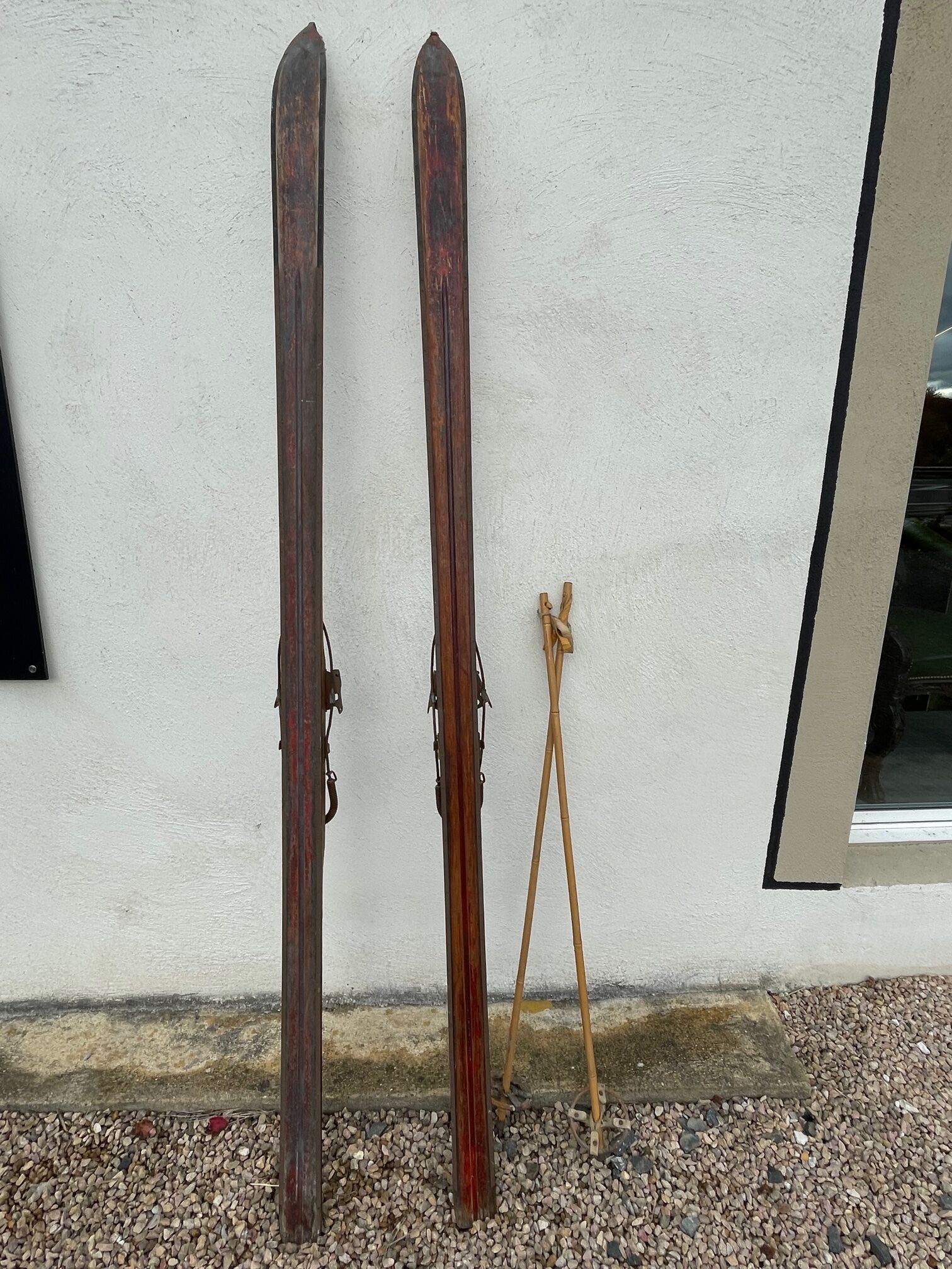 Wooden ski and its sticks