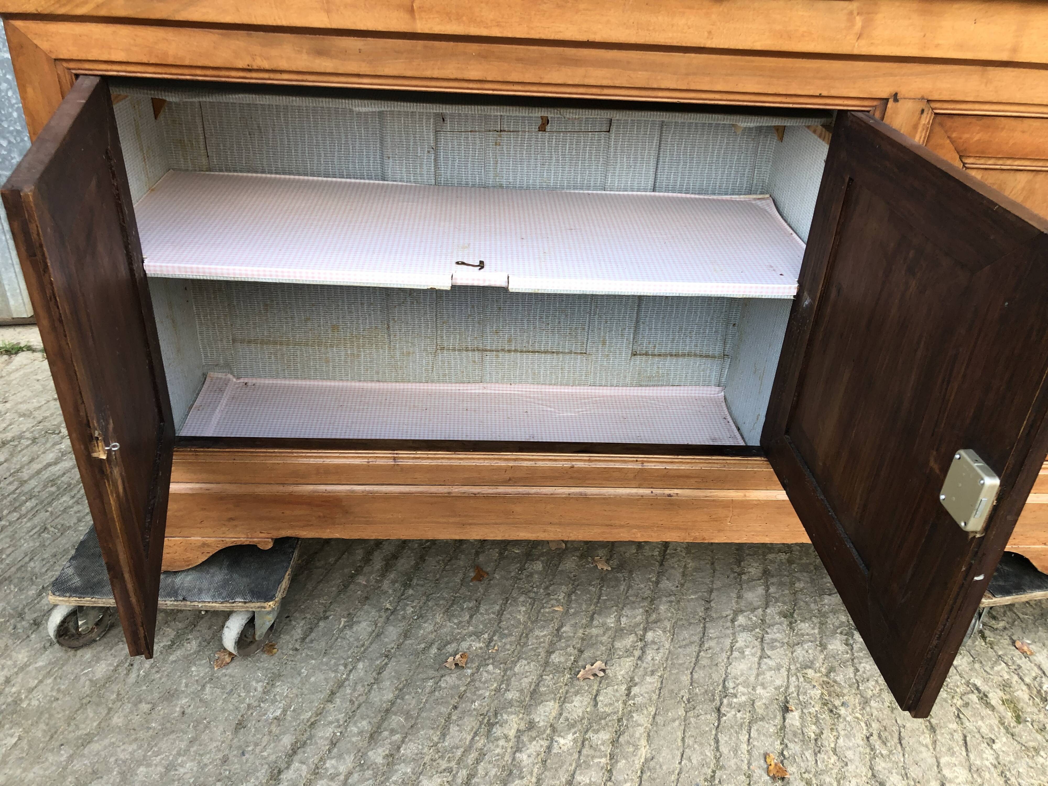 Louis Philippe style sideboard in solid walnut with 3 doors and 1 pull-out shelf.