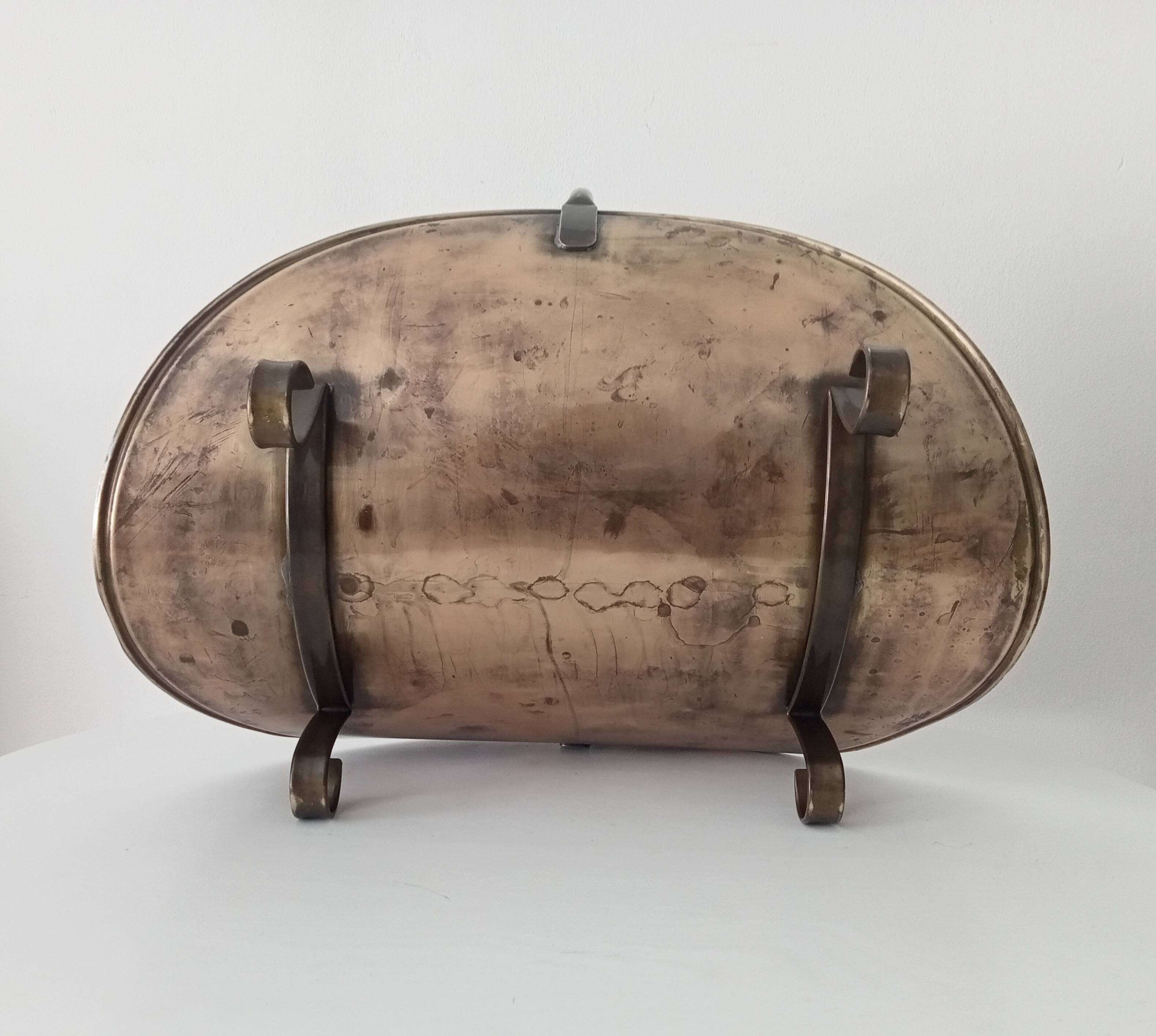 Old brass log holder