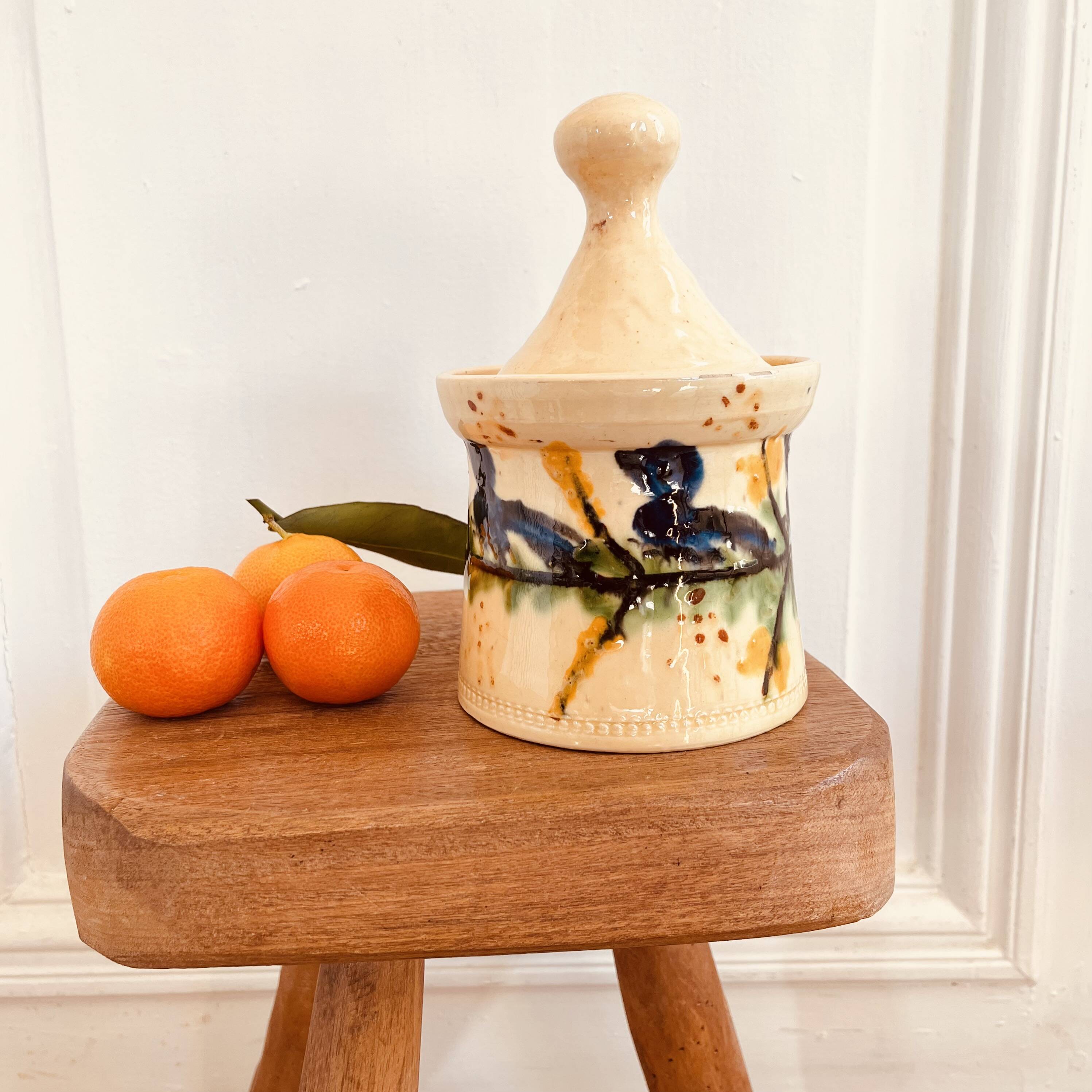 Hand painted ceramic covered pot