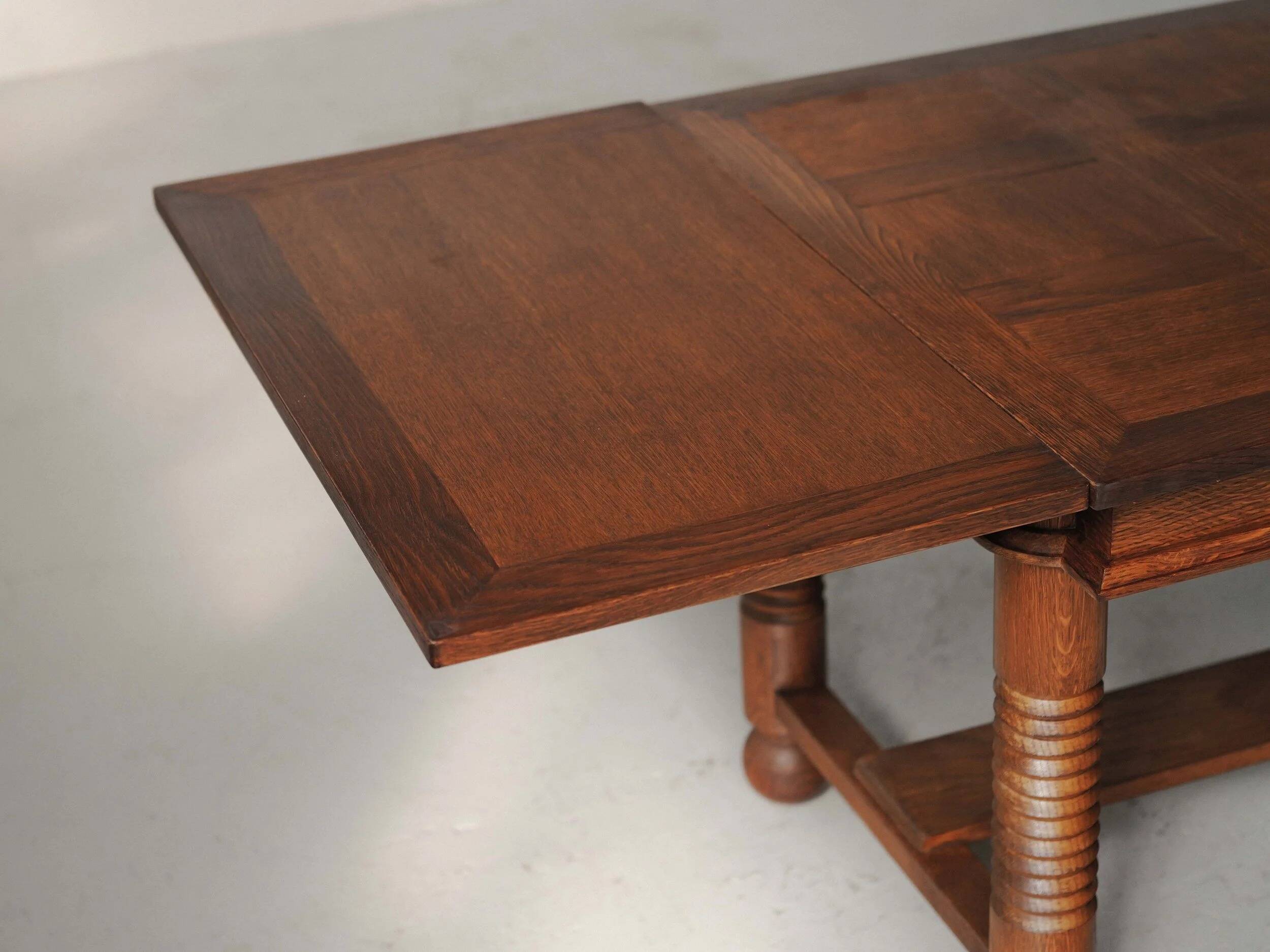 Modernist oak dining table, France, 1940–1950