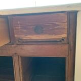 White counter with brass coin mechanism