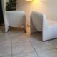 Pair of alky armchairs by Giancarlo Piretti