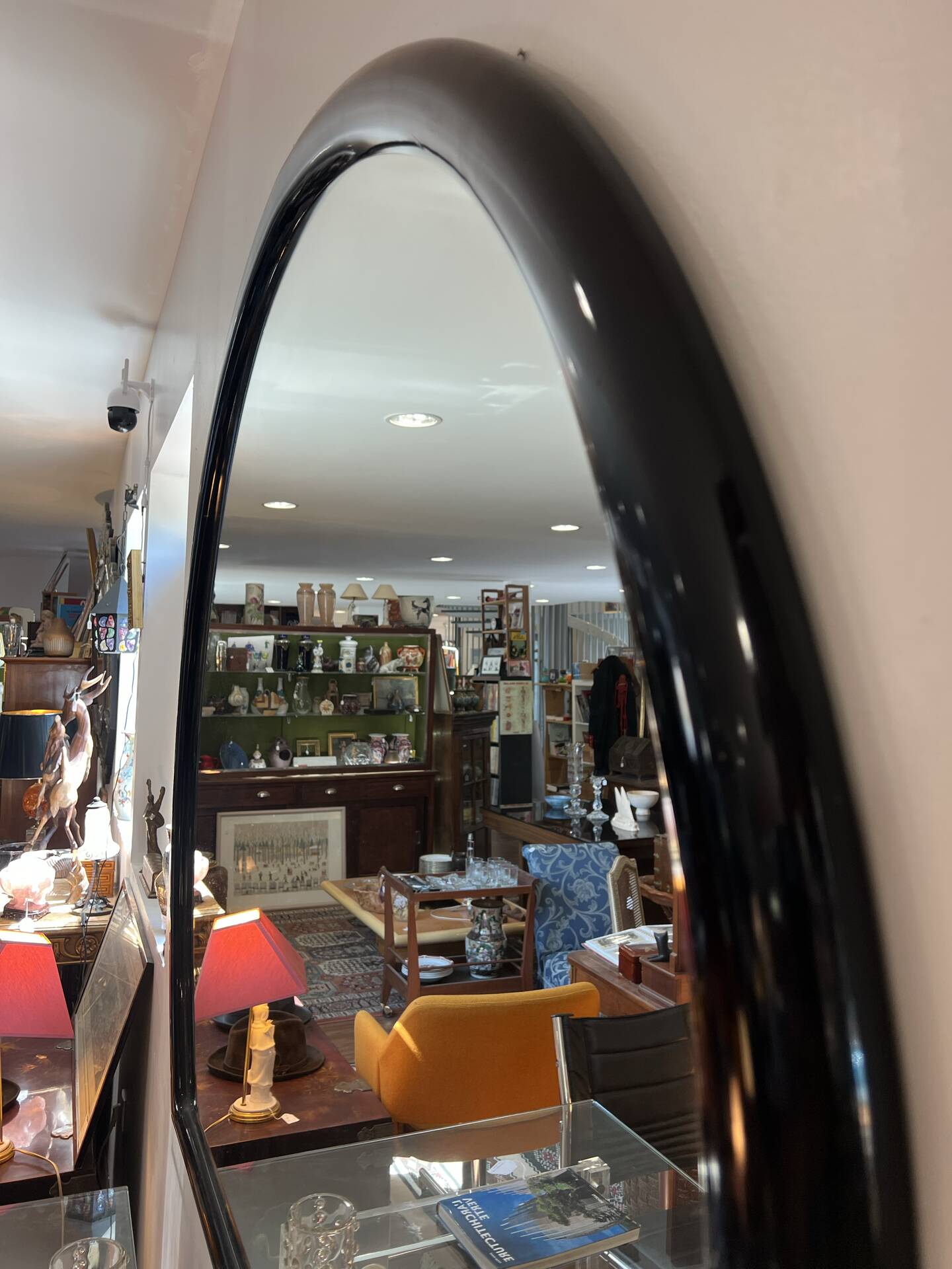 Large black lacquered mirror in 80s style