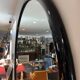 Large black lacquered mirror in 80s style