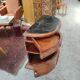 Pair of Art Deco half-moon bedside tables in walnut veneer and black marble.
